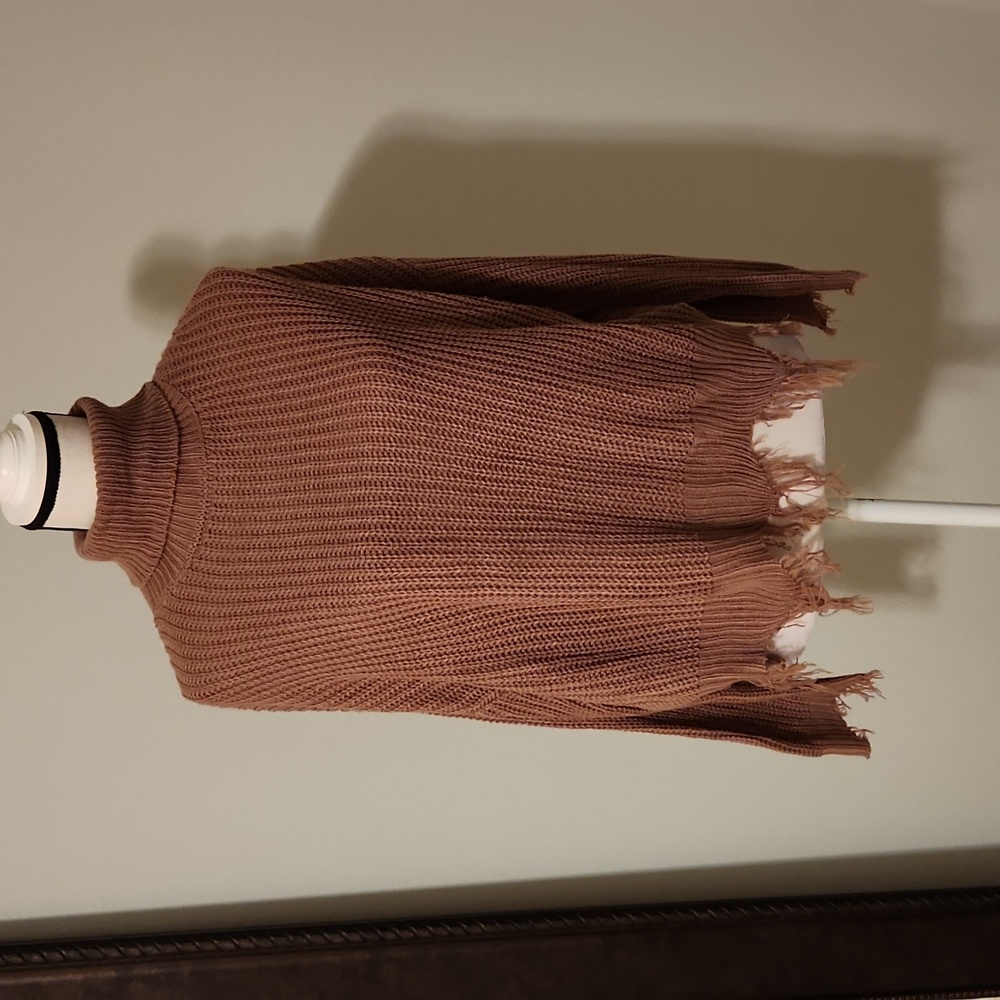 distressed turtleneck sweater